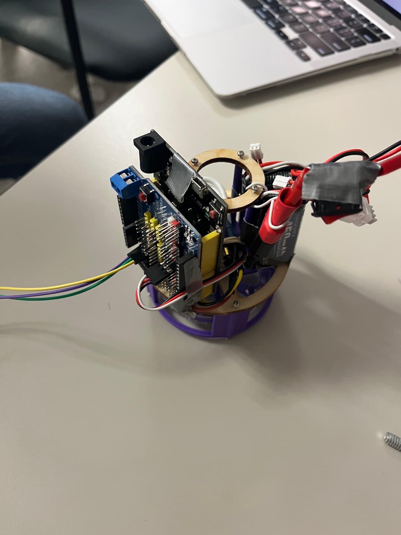 Embedded robotics prototype with exposed electronics and wiring